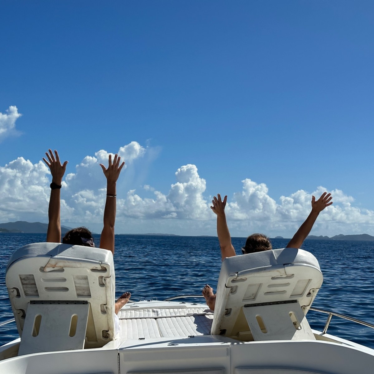 a group of people on a boat in the water